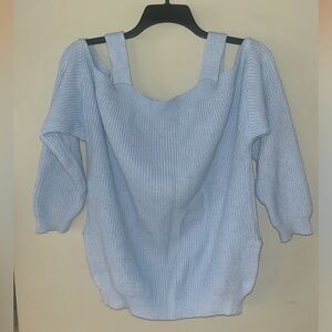 Light, blue sweater (could also be a sweater dress for someone 5ft and shorter)